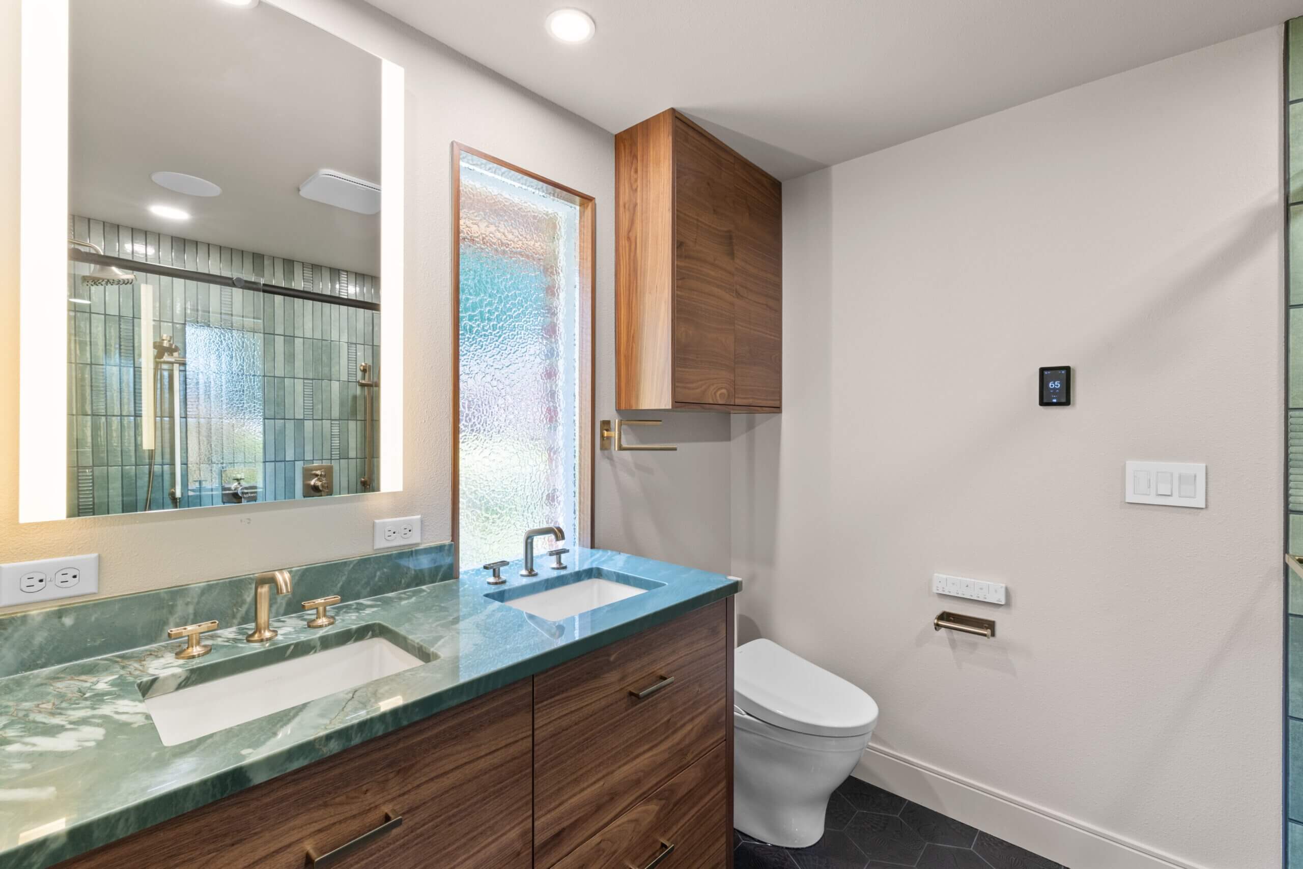 walnut cabinets, blue countertops, remodeled primary bathroom, mid-century modern